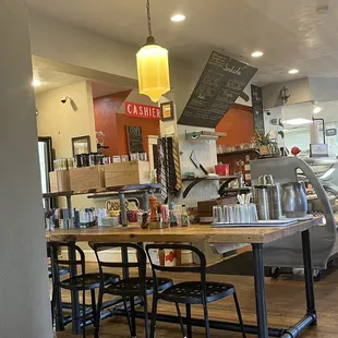 a table and chairs in a restaurant