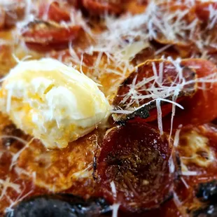 Pepperoni pizza with ricotta and a hot honey drizzle