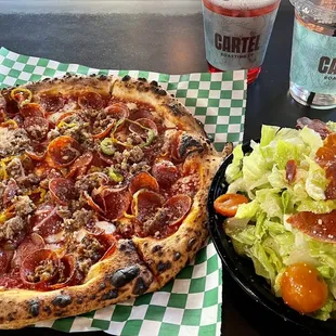 NINA HOUSE RED SAUCE, FRESH MOZZARELLA, PEPPERONI, HOUSE SAUSAGE, MINI SWEET BELL PEPPERS, RED ONION, PARM, OREGANO  And OLIVERS'GREENS