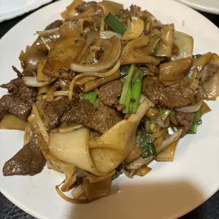 Dry stir fry beef and wide noodles