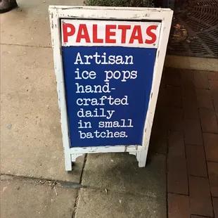 a sign for paletas