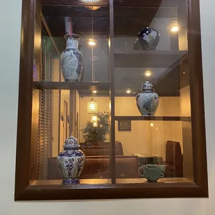 a display of vases in a window