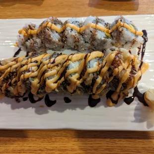 Two rolls (shrimp tempura and spicy crab)