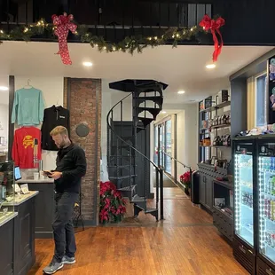 a man standing in a coffee shop