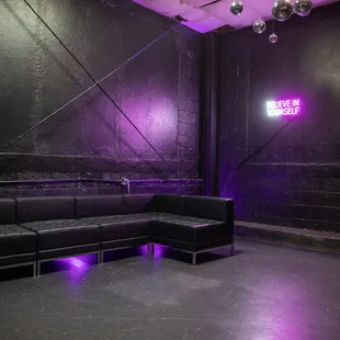 Comfy couch and neon lights