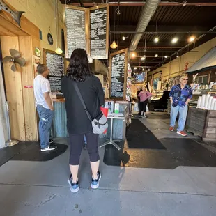 a woman standing at the counter