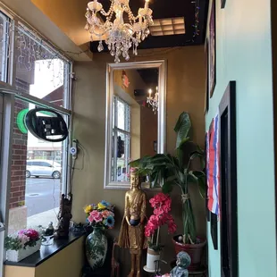 a chandelier in the window