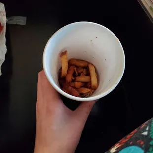 Barely filled medium fry container.