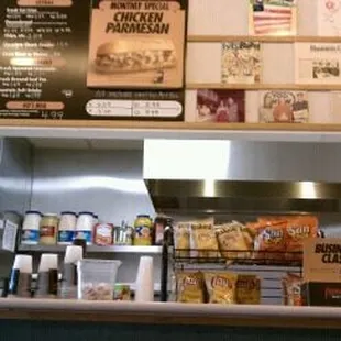 menus on the wall above the counter