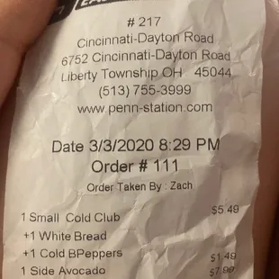 a person holding a receipt