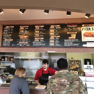 menus and staffs at the counter
