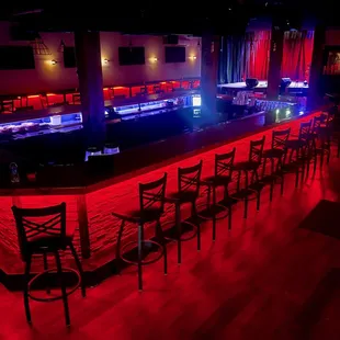a bar with red lights