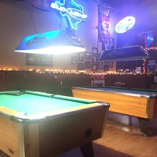 pool tables and neon signs