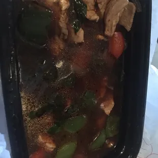 My dinner. 1/3 full, mostly oily,  salty sauce. They charge like $12 for this.