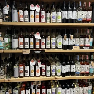 a shelf full of liquor