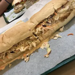 The pitt panther: breaded chicken, thousand island, Cole slaw, and mozzarella cheese