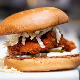 a fried chicken sandwich with coleslaw