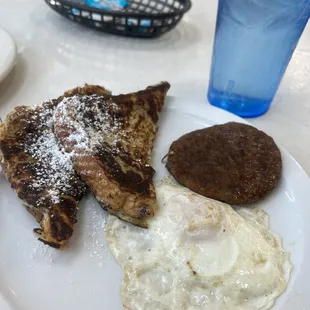 My breakfast of French Toast, egg and sausage