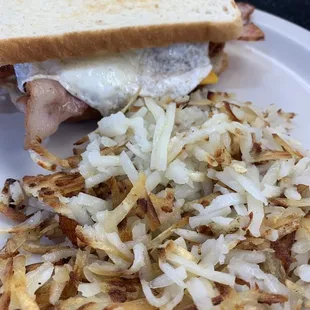 Hash browns with a breakfast sandwich.  Yummmmm