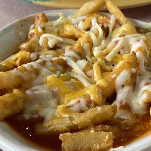 This is not a full order of fries. It's the fries that come with my burger. Red chile here is awesome. Better than most.