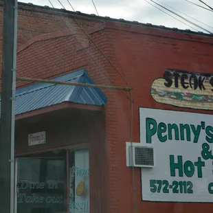 the front of penny&apos;s pizza and hot sub