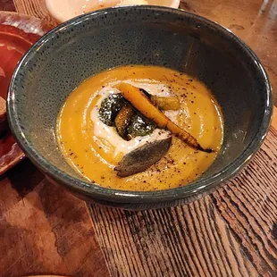 kabocha squash bisque, brown butter carrot, pistou, creme fraiche
