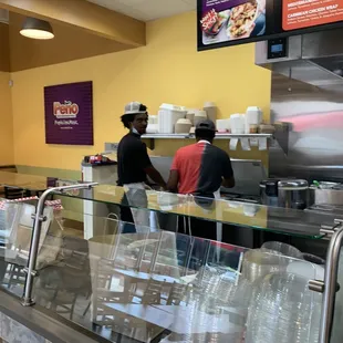 Malik and the crew preparing lunch for customers
