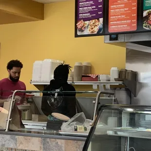 Diego and the crew making food