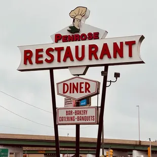 a sign for penrose restaurant diner