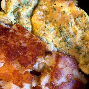 Broccoli cheese omelette with crispy potatoes. Delish!