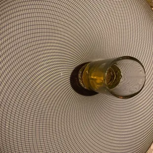 a glass of wine on a table