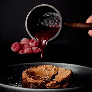 Molten Brandy Truffle with raspberry Grand Marnier sauce