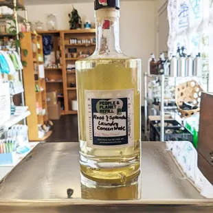 A repurposed bottle filled with concentrated laundry detergent is weighed prior to checkout.