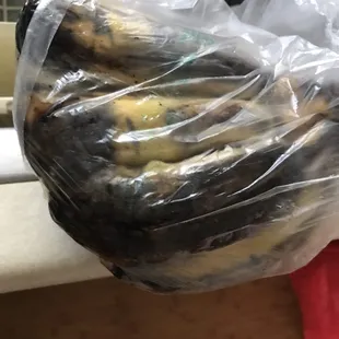 a bunch of bananas wrapped in plastic