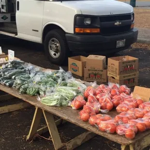 a man selling vegetables