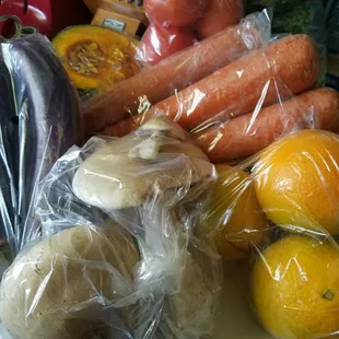 Apples, bananas, squash, sweet potato, mushrooms, kale, eggplant, carrots and tomatoes. Today I totally splurged and spent $18 LOL