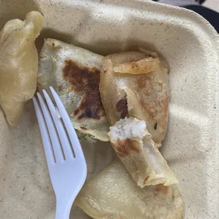 a fork in a styrofoam container