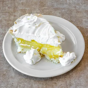 a slice of lemon pie on a plate