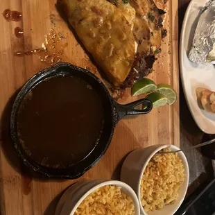 This is the birria tacos. The tacos were good the consommé was a little watery. Rice could use more seasoning but delish all together.