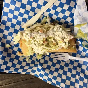 Barbacoa empanada with all the toppings