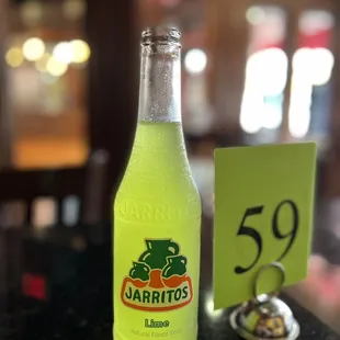 Like Jarritos (they got several flavors) but I feel lime pairs nicely with their food.