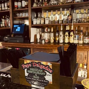 a bar with a variety of liquors