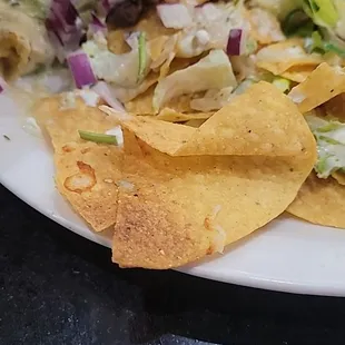 Burnt chips on my beef super nacho