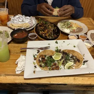 The combo fajitas, chorizo and steak tacos, the house margarita and the mango margarita