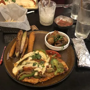 Pepe Pollo - smothered grilled fajita chicken, crispy potatoes and rainbow carrots cooked to perfection.