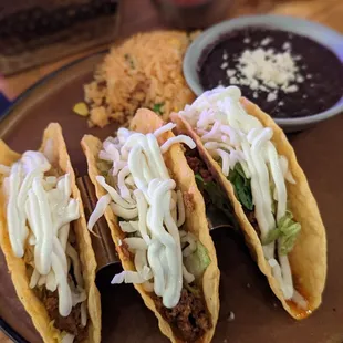 three tacos on a plate