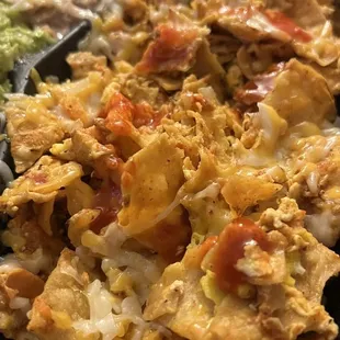 Chilaquiles red sauce with scrambled eggs
