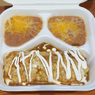 Sm Beef Burrito, with red sauce, cheese sauce and sour cream on top. Toppings inside burrito, as much as you want !