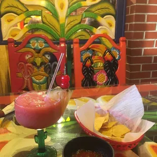 Raspberry Margarita, chips and salsa. We liked all. Yum!