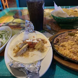 Fajitas with chips and salsa.